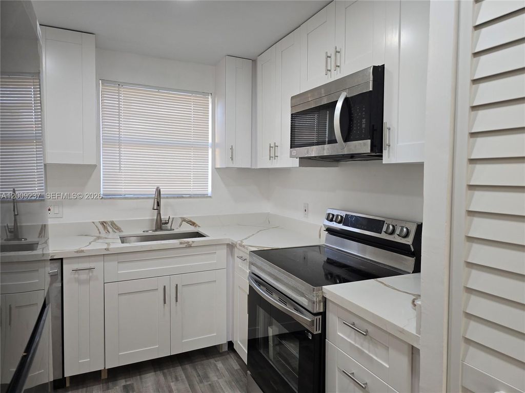 Photo of 11477 NW 39th Ct #205-1, Coral Springs, FL 33065 (MLS # A12009237)