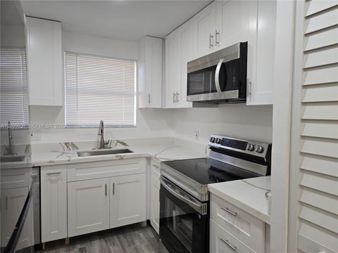 Photo of 11477 NW 39th Ct #205-1, Coral Springs, FL 33065 (MLS # A12009237)