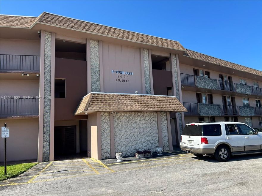 Welcome to this charming ground-floor condo located in desirable East Plantation, just minutes from the Turnpike and I-95. This spacious two-bedroom, two-bath residence offers a peaceful lake view and a comfortable, well-designed layout. Surrounded by numerous shopping plazas and malls, everyday conveniences are right at your doorstep.
The gated community provides added security and features two swimming pools for residents to enjoy. Schools are conveniently close, adding to the home’s appeal. Recent upgrades include new electrical installed throughout the unit. Enjoy the ease of two assigned parking spaces directly in front of your door, a laundry room just steps away, and additional storage located on the first floor. This property perfectly combines location, comfort, and convenience.
