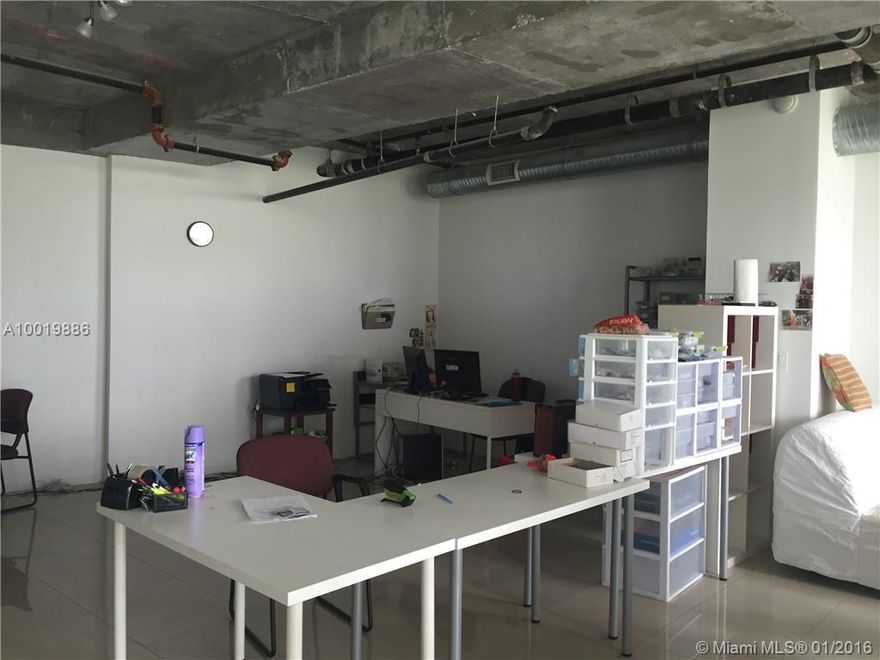 Great live/work unit at desirable Midblock condo. 1307 sqft of very spacious open layout that can accommodate any type of business / office. Only live/work available in the building! won't last long. Commercial lease available.