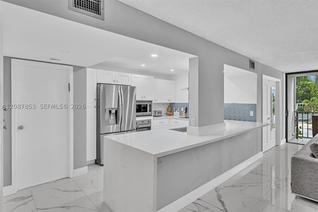 Photo of 1000 Parkview Dr #329, Hallandale Beach, FL 33009 (MLS # A12087853)