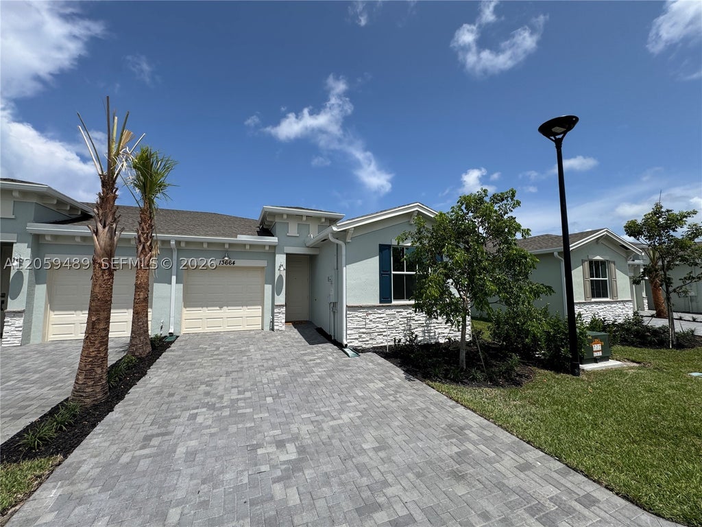 Photo of 13664 Jubilee Ln, Delray Beach, FL 33484 (MLS # A12059489)