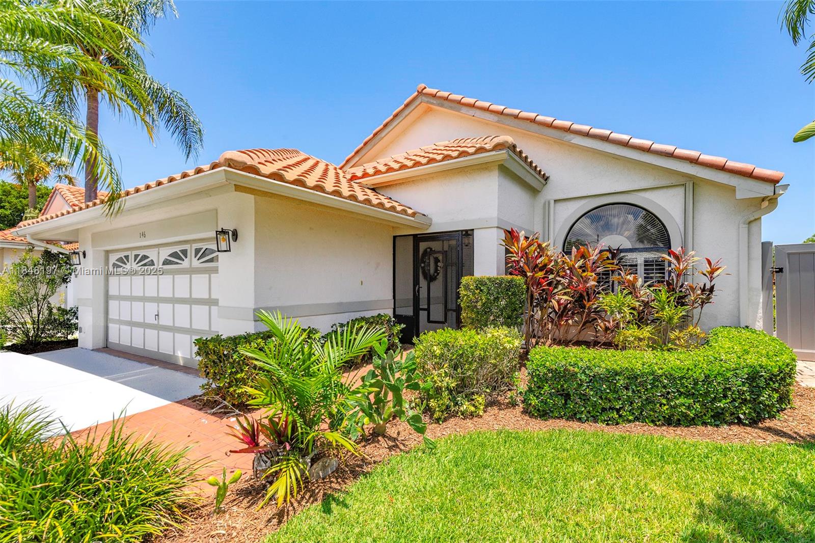 A truly turnkey home with one of the best lake-view lots in Citrus Glen! 3-bedroom, 2-bath home offers a bright, open floor plan with cathedral ceilings, skylights, and beautiful hardwood floors throughout. Freshly painted and move-in ready, the home also features new bathroom doors and fresh sod in the patio area — perfect for relaxing or entertaining. Custom cabinets, granite countertops, and stainless steel appliances. Enjoy three separate outdoor spaces: side yard patio for morning coffee, a screened-in back patio for gatherings, and a welcoming front porch. Additional features include accordion hurricane shutters, an A/C from 2018, a 2010 roof, newer washer/dryer. Located in a gated community with a pool, playground, and clubhouse. Priced to sell — don’t miss this opportunity!