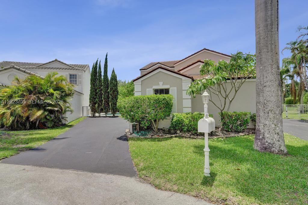 Photo of 21461 Sawmill Ct, Boca Raton, FL 33498 (MLS # A12023793)