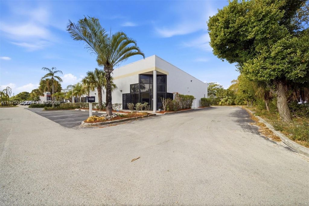 Photo of 2891 NW 22nd Ter, Pompano Beach, FL 33069 (MLS # A11975045)