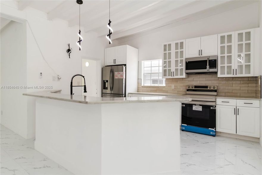 Fully Remodeled Modern Home – Minutes from the Beach!
Discover this stunning 3-bedroom, 2-bath single-family home is perfectly located near Hollywood and Dania Beach, downtown, and just a short drive to Fort Lauderdale Airport. Ideal for personal living or as a lucrative Airbnb investment.
This home features a spacious, open living area with a sleek modern design in timeless white and gray tones. The brand-new kitchen boasts custom cabinets, quartz countertops, and stainless steel appliances. Bathrooms are tastefully remodeled with a fresh, contemporary style.
Enjoy Florida living on the wood deck patio, perfect for outdoor dining and entertaining. Located in a high-demand area close to beaches, shops, dining, and major highways.