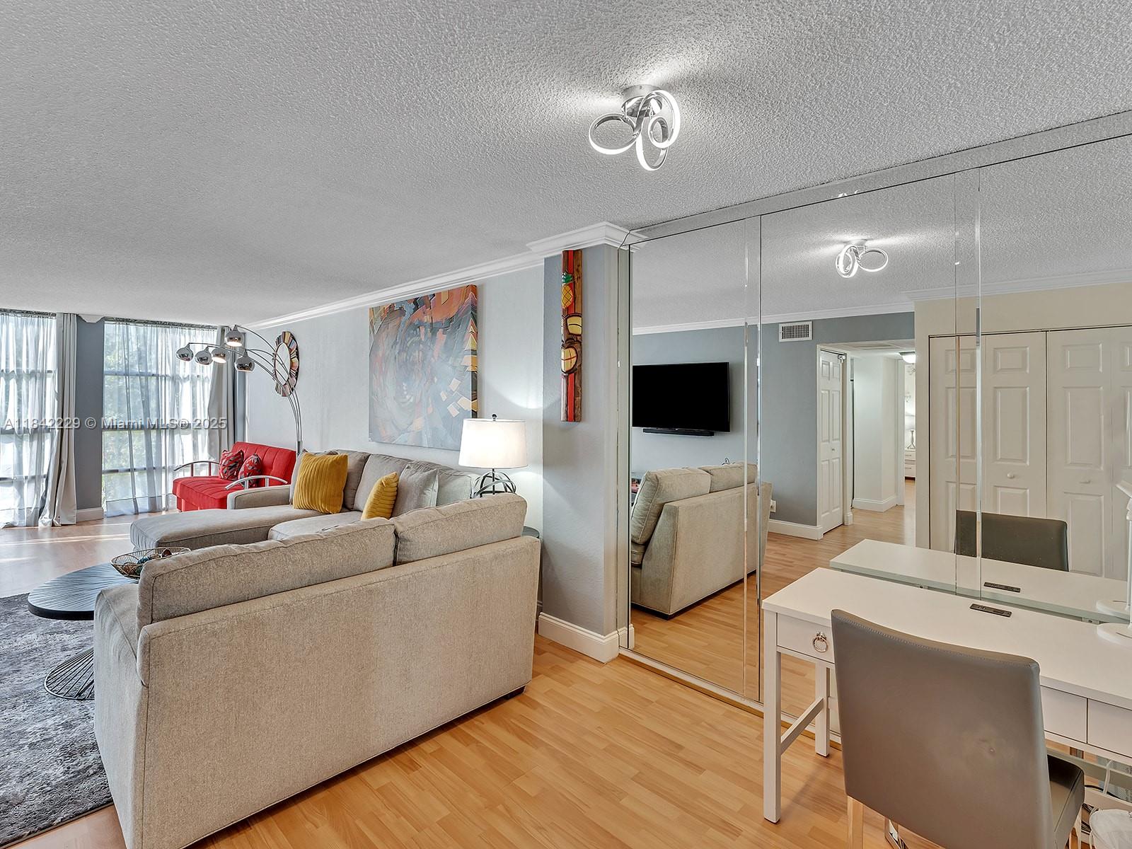 WALKING DISTANCE TO OCEAN SPACIOUS AND FULLY FURNISHED 2 BED/1,5 BATHS THIS COMFORTABLE UNIT IS LOCATED RIGHT IN THE HEART OF HALLANDALE. GREAT FOR INVESTORS , UNIT CURRENTLY RENTED FOR $2300 UNTIL SEPTEMBER , WALK TO THE BEACH, SHOPPING CENTERS & SUPERMARKETS, 24 HRS FULLY SECURED BUILDING, POOL, GYM AND TENNIS COURT, JOGGING AREA. APPLIANCES HAS BEEN UPDATED RECENTLY.
