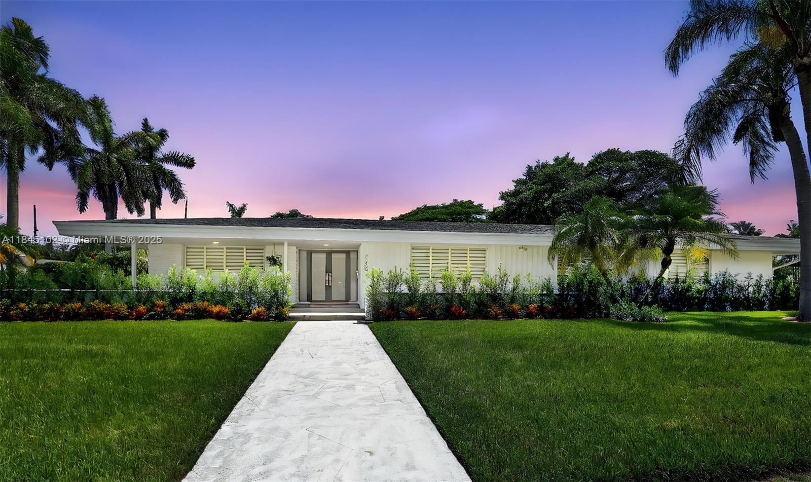 This exquisite beautifully updated 4BD/4BA residence, located in prestigious North Palmetto Bay steps away from Pinecrest, sits on a sprawling 18,000 sq ft Corner lot in an upscale, quiet, suburban feel neighborhood. Inside, a bright and open floor plan, welcomes you with abundant natural light streaming through impact doors and windows. This home features a modern kitchen, formal dining room and a spacious primary bedroom with a private sitting area. Enjoy proximity to excellent schools, parks, shopping malls, and fine restaurants - all just minutes away. Two A/C units, two water heaters, and integrated smart technology offer control of lighting, climate and security for elevated convenience.Whether you're seeking tranquility, connectivity or prestige, this beautiful home delivers it all.