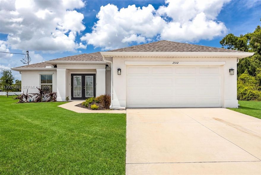 PRICED TO SELL QUICKLY! Step into modern Florida living with this like new 2023 construction home, ideally positioned in a desirable area of Cape Coral and ready for its next owner. From the moment you arrive, the double door entry creates a grand first impression, leading into a bright open concept great room designed for both everyday living and easy entertaining. Natural light fills the home, highlighting clean modern finishes and a seamless flow throughout. The kitchen is the heart of the home, featuring quartz countertops, ample cabinetry and generous prep space, perfect for gatherings or quiet evenings. A split bedroom layout offers privacy and functionality, while all four bedrooms provide comfortable space for family, guests or a home office. Laminate wood look flooring throughout adds durability, style and easy maintenance. Step outside to a large backyard with plenty of room for a pool or your dream outdoor retreat. Located just a short drive from Pine Island for boating, waterfront dining and island hopping and within reach of Southwest Florida’s white sand Gulf beaches, this home delivers the lifestyle buyers want. Move in ready with the feel of new construction, this spacious four bedroom property checks all the boxes, schedule your private showing today and experience the best of Florida living.
