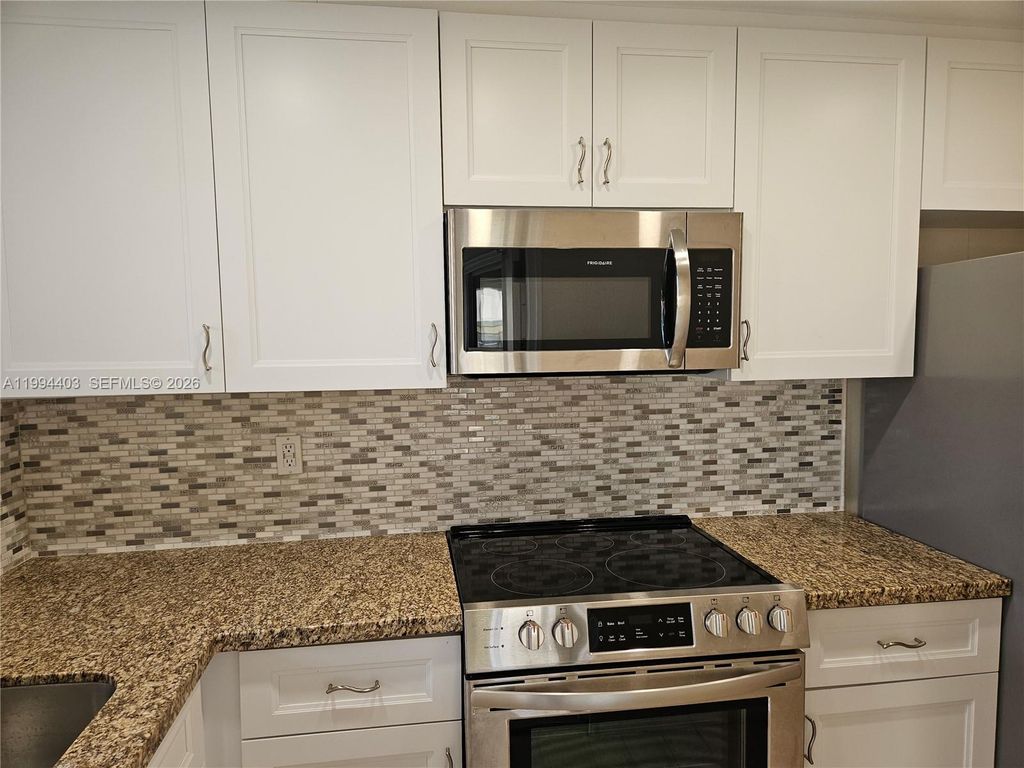 Photo of 250 Layne Blvd #105, Hallandale Beach, FL 33009 (MLS # A11994403)