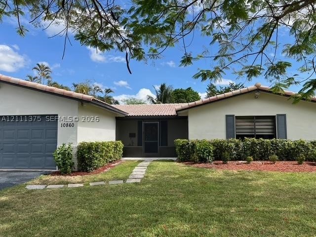 Photo of 10860 NW 40th St, Coral Springs, FL 33065 (MLS # A12111375)