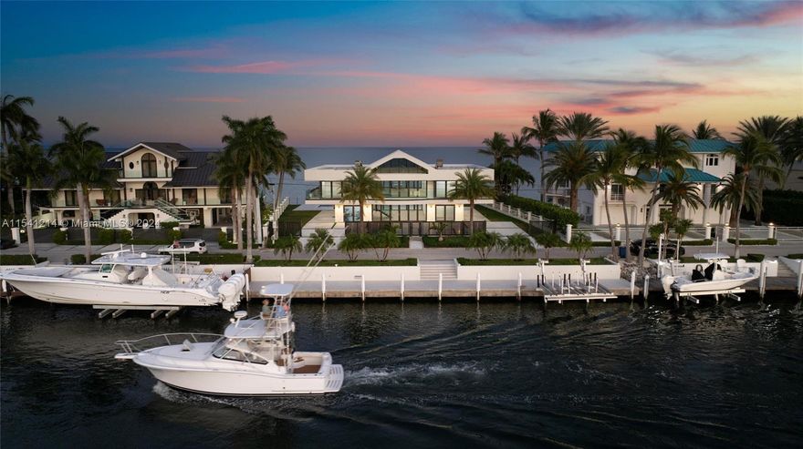 The ocean is calling all big boaters and connoisseurs of Keys luxury living. This stunning contemporary oceanfront home offers the epitome of luxury living with the most breathtaking views, plus 100 feet of protected deep-water dockage. Water on two sides of the residence exemplifies a Modern Design with timeless appeal. This home seamlessly blends luxury with functionality, offering a perfect balance of form and function. Retreat to the comfort of three spacious bedrooms located on the main level, providing convenience and privacy for you and your guests. Spectacular Views: Enjoy panoramic vistas of the sparkling ocean and vibrant skies from sunrises to distant sunsets from every corner of your home.