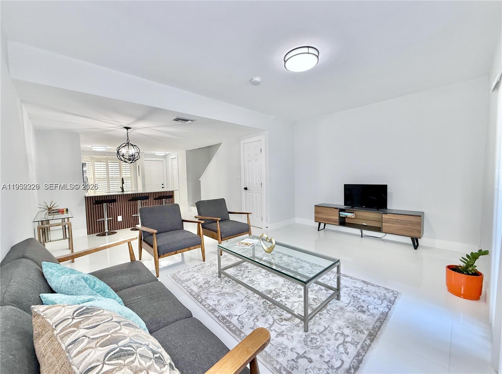 View photos, virtual tours, details... 2699 NE 15th St