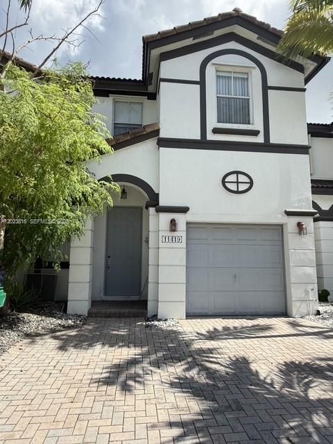 Photo of 11419 NW 76th Ter, Doral, FL 33178 (MLS # A12023816)