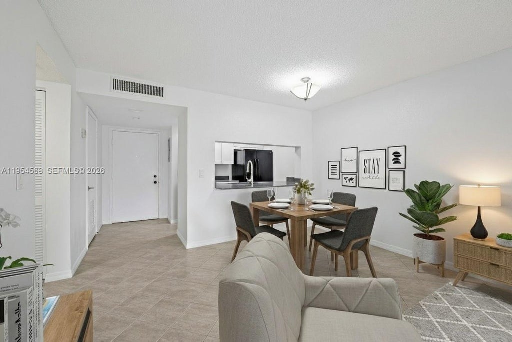 Photo of 10001 W Atlantic Blvd #218, Coral Springs, FL 33071 (MLS # A11954568)