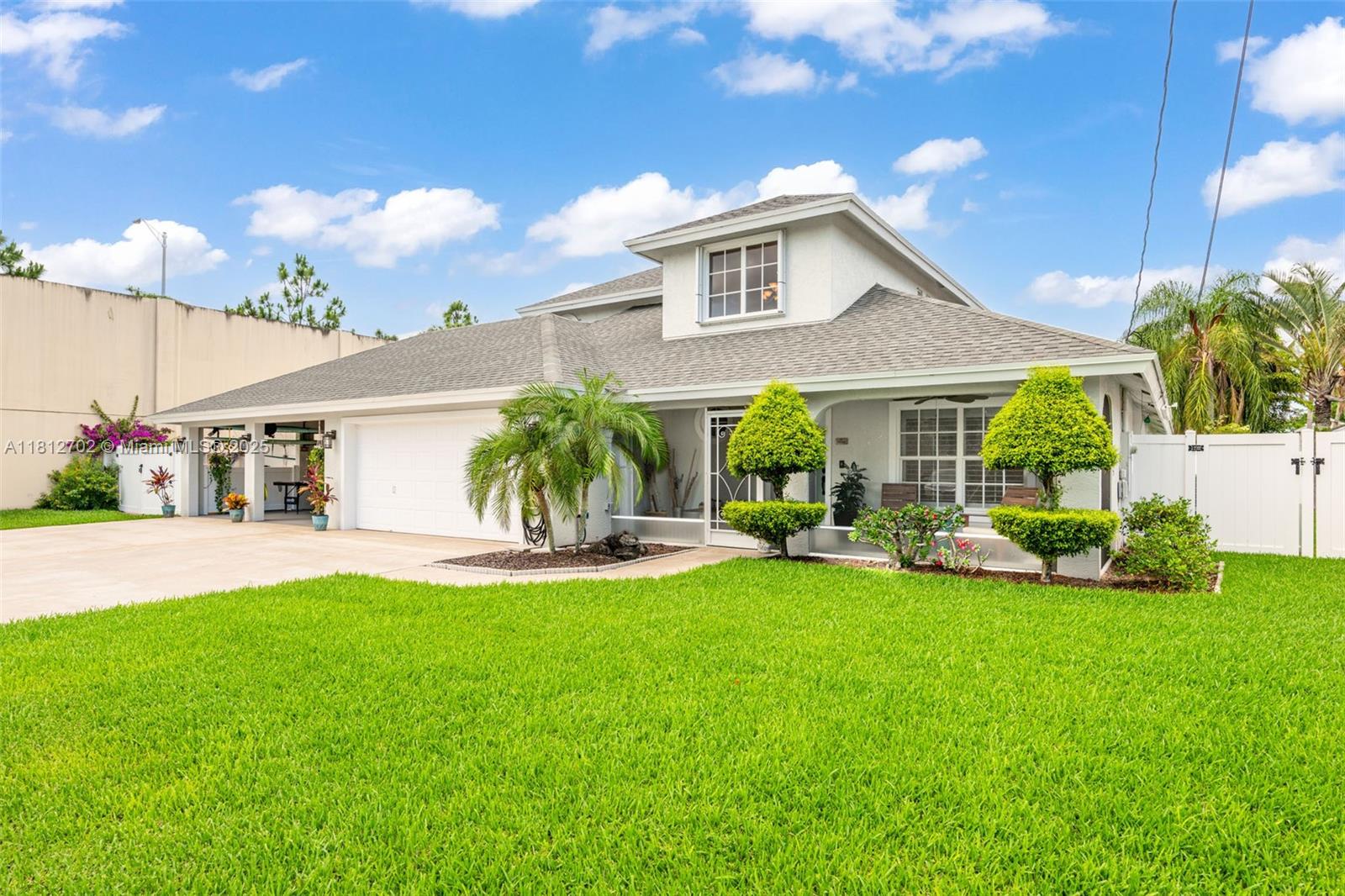 Spacious 4BR/3.5BA CBS home in Jupiter’s sought-after Heights neighborhood—Second largest home in the Heights and no HOA! Features two master suites on the main level and two bedrooms + loft upstairs—ideal for families or guests. Enjoy a screened pool, patio, 2-car garage, 2-car carport, and extended driveway. Detached workshop is prewired for phone, cable, and air hoses—perfect for hobbyists or weekend mechanics. Bright open layout with renovated kitchen, granite counters, stainless steel appliances, and breakfast bar. Oversized fenced lot includes boat/RV parking, BBQ area, and sheds. New roof 2021. Minutes to top-rated schools, beaches, Abacoa, and I-95.