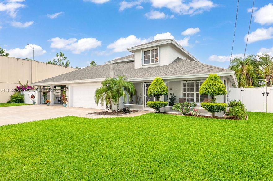 Spacious 4BR/3.5BA CBS home in Jupiter’s sought-after Heights neighborhood—Second largest home in the Heights and no HOA! Features two master suites on the main level and two bedrooms + loft upstairs—ideal for families or guests. Enjoy a screened pool, patio, 2-car garage, 2-car carport, and extended driveway. Detached workshop is prewired for phone, cable, and air hoses—perfect for hobbyists or weekend mechanics. Bright open layout with renovated kitchen, granite counters, stainless steel appliances, and breakfast bar. Oversized fenced lot includes boat/RV parking, BBQ area, and sheds. New roof 2021. Minutes to top-rated schools, beaches, Abacoa, and I-95.