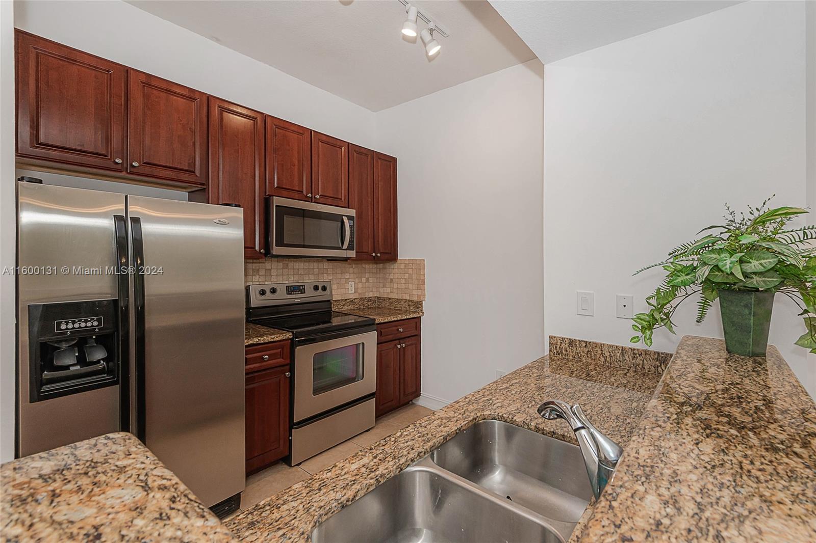 NEWLY RENOVATED RECENTLY COMPLETED!!!! Spacious 1BED/1BATH condo with high ceilings, wonderful closet space, kitchen with stainless steel appliances and granite counter tops open to the dining/livingroom. Bright and light with high ceilings. Amazing view from balcony onto a lovely swimming pool. Terrific amenities, fitnes center and nicely appointed club room with an additional business center for work away from home. Outdoor BBQ area and children's pool. Love to have you come to see.