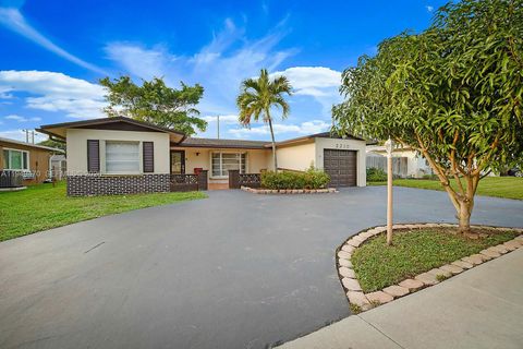 Photo of 2210 NW 91st Ter, Pembroke Pines, FL 33024 (MLS # A11949470)