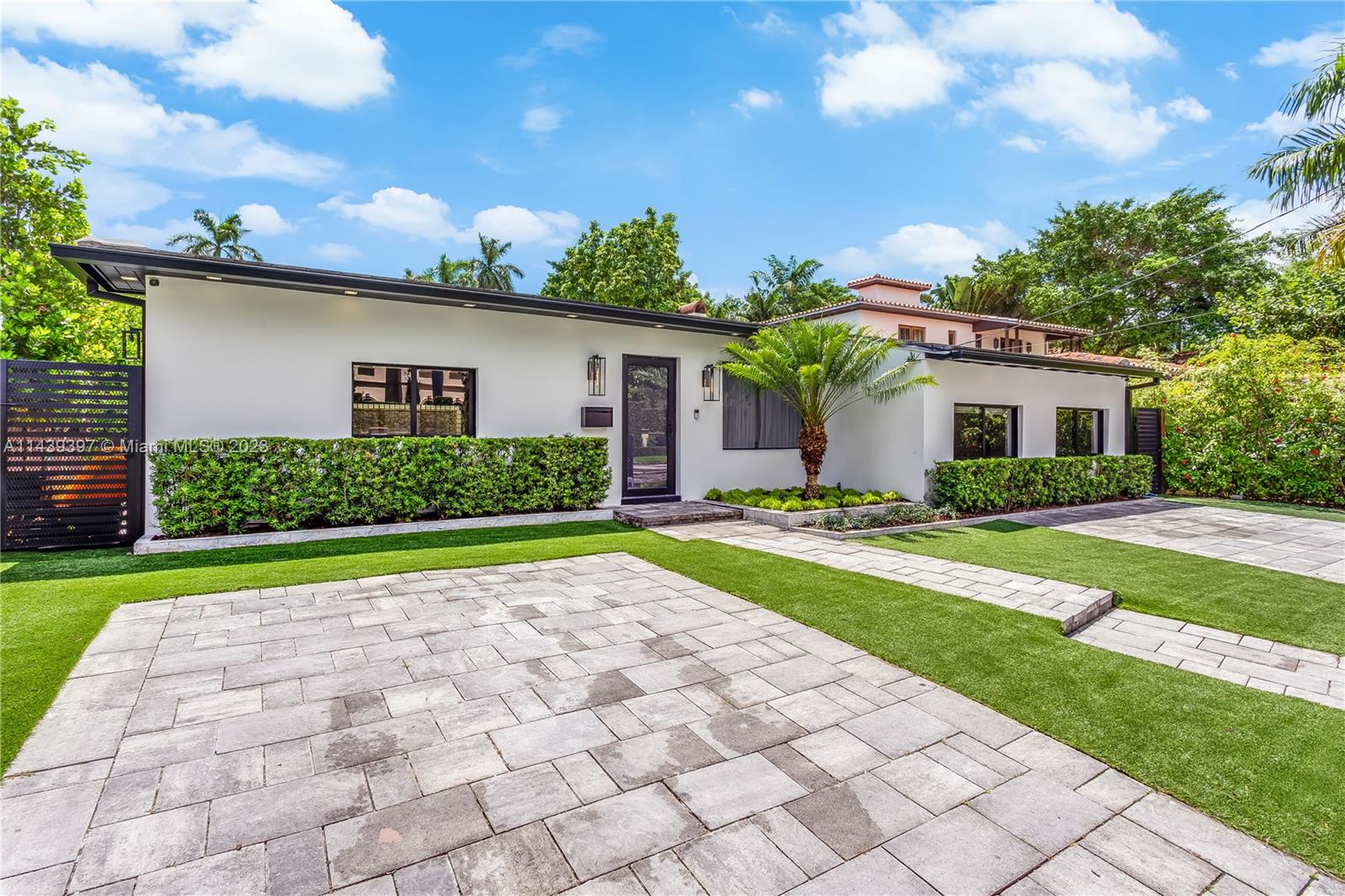 Located on the prestigious North Bay Rd this gated 4 bed/4.5 bath newly renovated turn key house will wow you
with its overall attention to detail. Beautiful new light wood oak floors run throughout the entire home. All 4
spacious light filled bedrooms have full en-suite bathrooms and great closet space. The house also has two
separate living areas perfect for Miami Beach entertaining and/or family use. The kitchen features all top of the
line appliances, plenty of counter space and generous storage. Outside you will find a beautiful oversized pool,
large turfed backyard, full summer kitchen all surrounded by fully matured landscaping with all new landscape
lighting. This is the North Bay Rd house you've been looking for to call home.