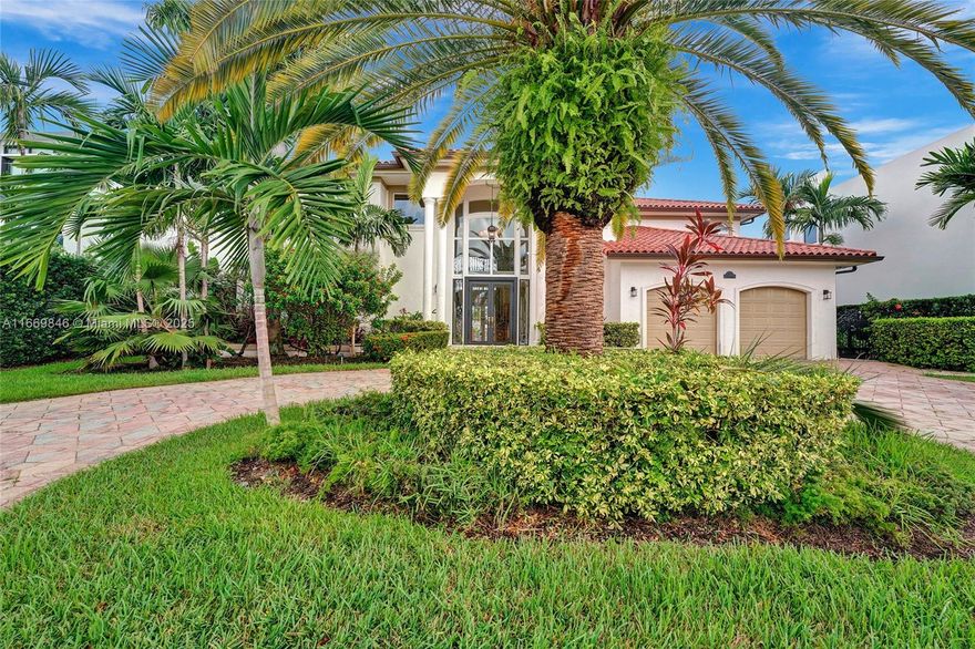 Stunning two-story Mediterranean-style waterfront home with 5 bedrooms, an office, 6 full bathrooms. The property features an open floor plan with high ceilings, 8-foot doors, and marble flooring throughout. It includes a private boat dock providing direct ocean access without fixed bridges.
The interior is equipped with an elevator, wet bar, and hurricane-impact windows. The kitchen features custom cabinetry and a gas stove, while the master suite includes a spa-style bathroom with a separate shower, sauna, and soaking tub. Two large walk-in closets and a private balcony overlooking the pool and waterway.
The pool area includes a covered barbecue space. 2-car garage and a circular driveway. The home is located in the 24-hour guard-gated community of Eastern Shores, close to beaches,etc.