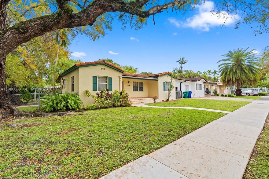 RARE OPPORTUNITY to acquire this Sun-filled and SPACIOUS home with a flexible floor plan in a premium neighborhood. Set on a 7,500 sq ft CORNER lot with great curb appeal, a fenced-in yard, and ROOM FOR A POOL, this property features a legal detached structure-ideal for a studio, home office, or in-law quarters. The main home offers 3 bedrooms and 2 bathrooms, along with bright, spacious and wide living areas filled with abundant natural light. The detached structure includes 1 bedroom and 1 bathroom, providing added flexibility. With great bones, this home is a blank canvas ready to be REIMAGINED TO YOUR TASTE. Ideally located just a short drive to Coconut Grove, Coral Gables, and Brickell—home to some of Miami’s finest dining, shopping & entertainment