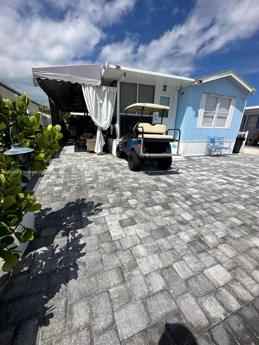 Completed recently remodeled manufactured home in the desired area of Calusa Campground. Manny amenities in the community, boat ramp, community pool , overnight docking, playground, basketball court and many more . Short rents allowed with Airbnb and Vrbo. Already registered with those apps getting generous monthly income. New Carport, outside shower. Washer and Dryer. That it can come fully furnished and golf cart included This home is ready for your next dream retirement or short term rental and make very good returns .Comes with future bookings also And proof of monthly income