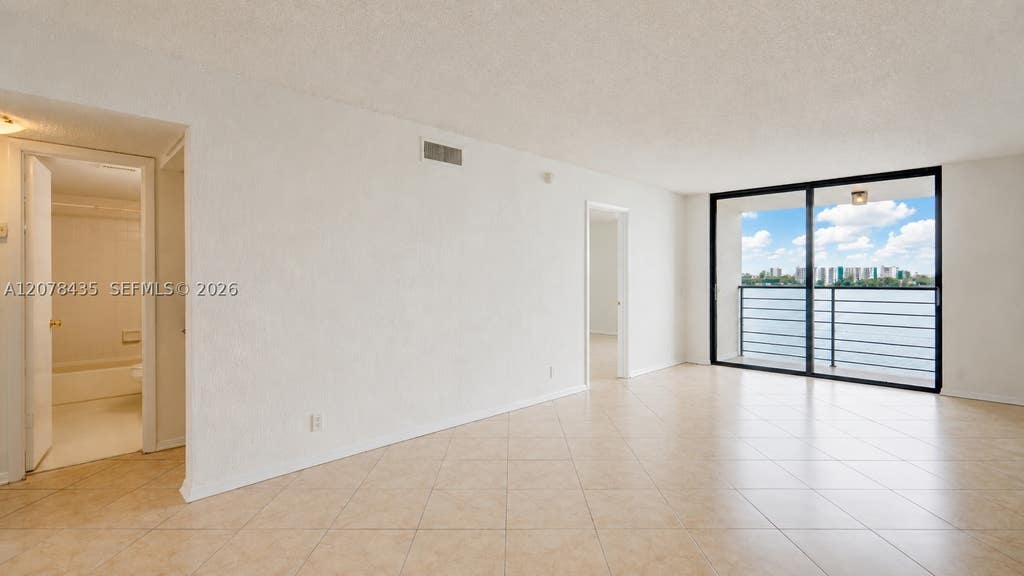 Photo of 114 Lake Emerald Dr #409, Oakland Park, FL 33309 (MLS # A12078435)