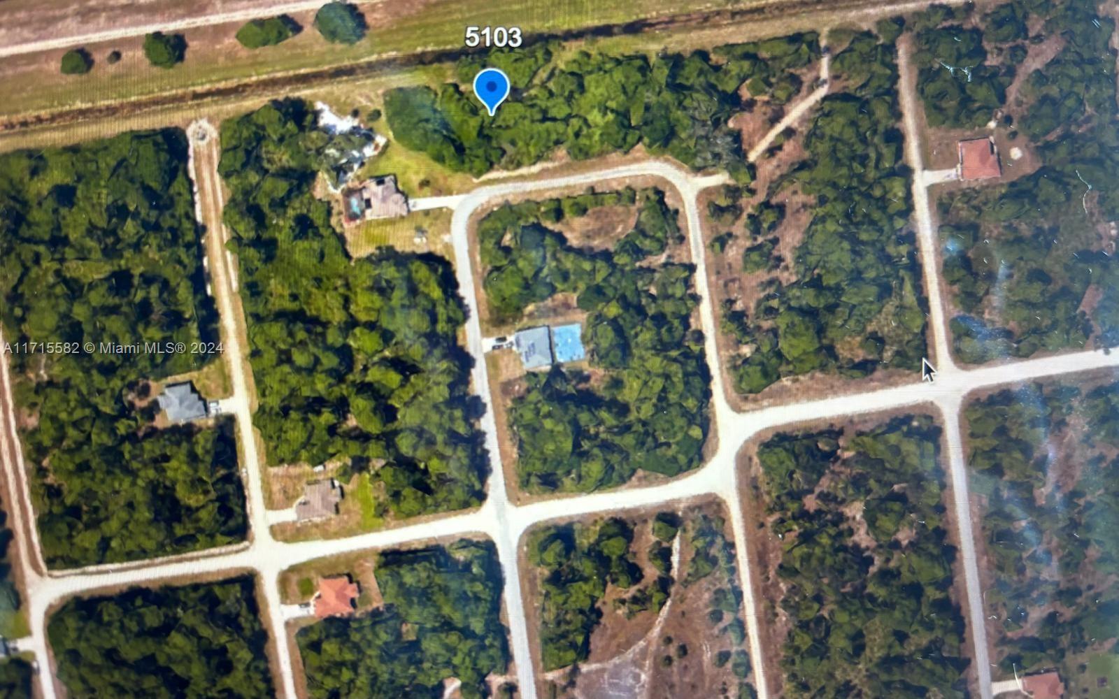 GREAT LOCATION backed to canal nestled away on a quiet paved street with utilities just minutes from major amenities and a quick commute to Fort Myers! Come build your DREAM HOME or INVEST today!