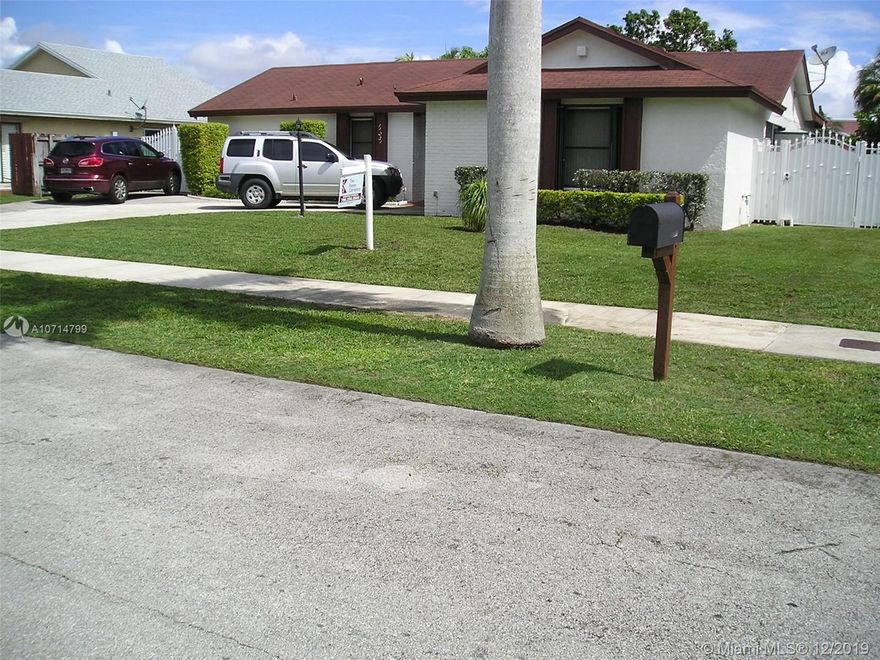 GREAT STARTER HOME ON A CUL-DE-SAC - NO THROUGH STREET IN CORAL WOODS. LOOKING TO DOWNSIZE? HERE IS YOUR DEAL. GREAT PROPERTY, SPACIOUS FAMILY ROOM FOR ENTERTAINING AND RELAXING . UNIQUE SITTING AREA IN THE MASTER ROOM OFFERS A SPECIAL APPEAL, AND IS SET UP    FOR THOSE 'ME MOMENTS', MASTER ALSO HAS TWO CLOSETS….. OTHER FEATURES INCLUDE: SOME TOP-OF-THE LINE STAINLESS STEEL  APPLIANCES, ACCORDION SHUTTERS ALL AROUND, LAUNDRY ROOM  OFF KITCHEN, FRENCH DOORS LEAD TO AN OPEN SLAB AREA WHICH IS IDEAL FOR OUTDOOR ENTERTAINMENT. THIS AREA CAN BE COVERED AND SCREENED IN. TWO  OUTSIDE STORAGE UNITS HELP KEEP THE AREA ORGANIZED. BRING YOUR CREATIVITY AND  MAKE THIS A REAL GEM.. ENDLESS POSSIBILITIES TO FALL IN LOVE WITH. DON'T MISS OUT ON THIS RARE OPPORTUNITY. COME TAKE A LOOK.