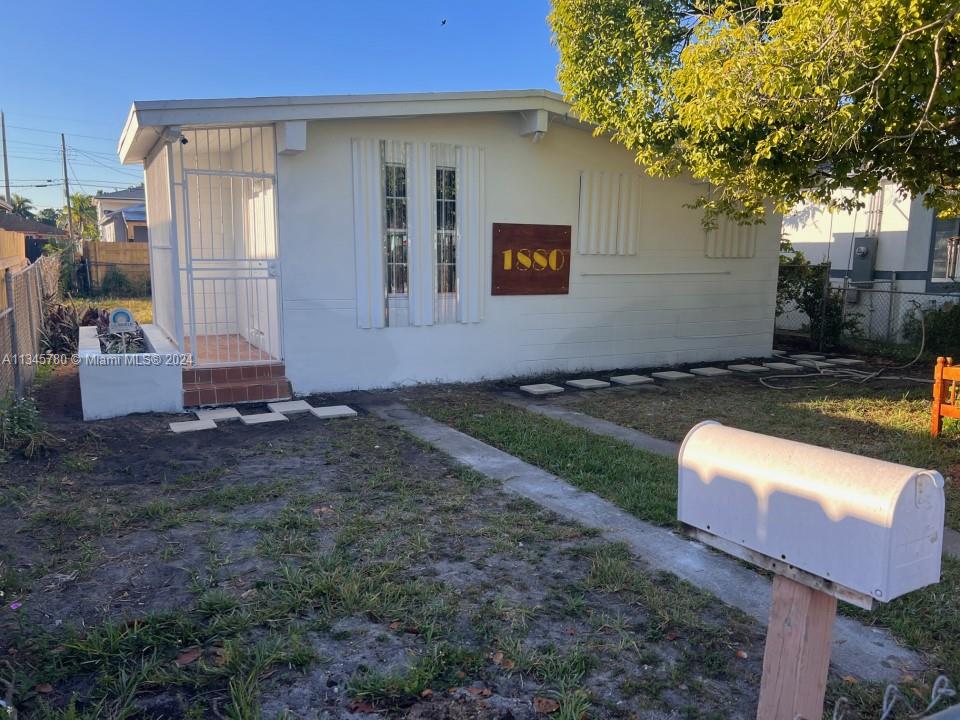 This is a fairly basic 3/1 house. It has cool northern exposure, logical layout, 2 porches, hurricane shutters, central AC, fully tiled floors, laundry room, on a small lot. CBS construction, easy to maintain. It sits on a small lot, typical in this neighborhood, and is on a septic tank. It generated a consistent rental income, and therefore, we owned it as an investment property for a decade. Do NOT disturb tenants! Rent to own option available.