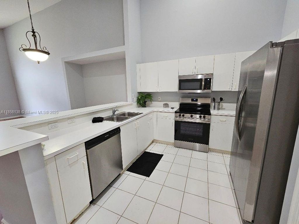 Photo of 6568 Marissa Cir, Lake Worth, FL 33467 (MLS # A11858138)