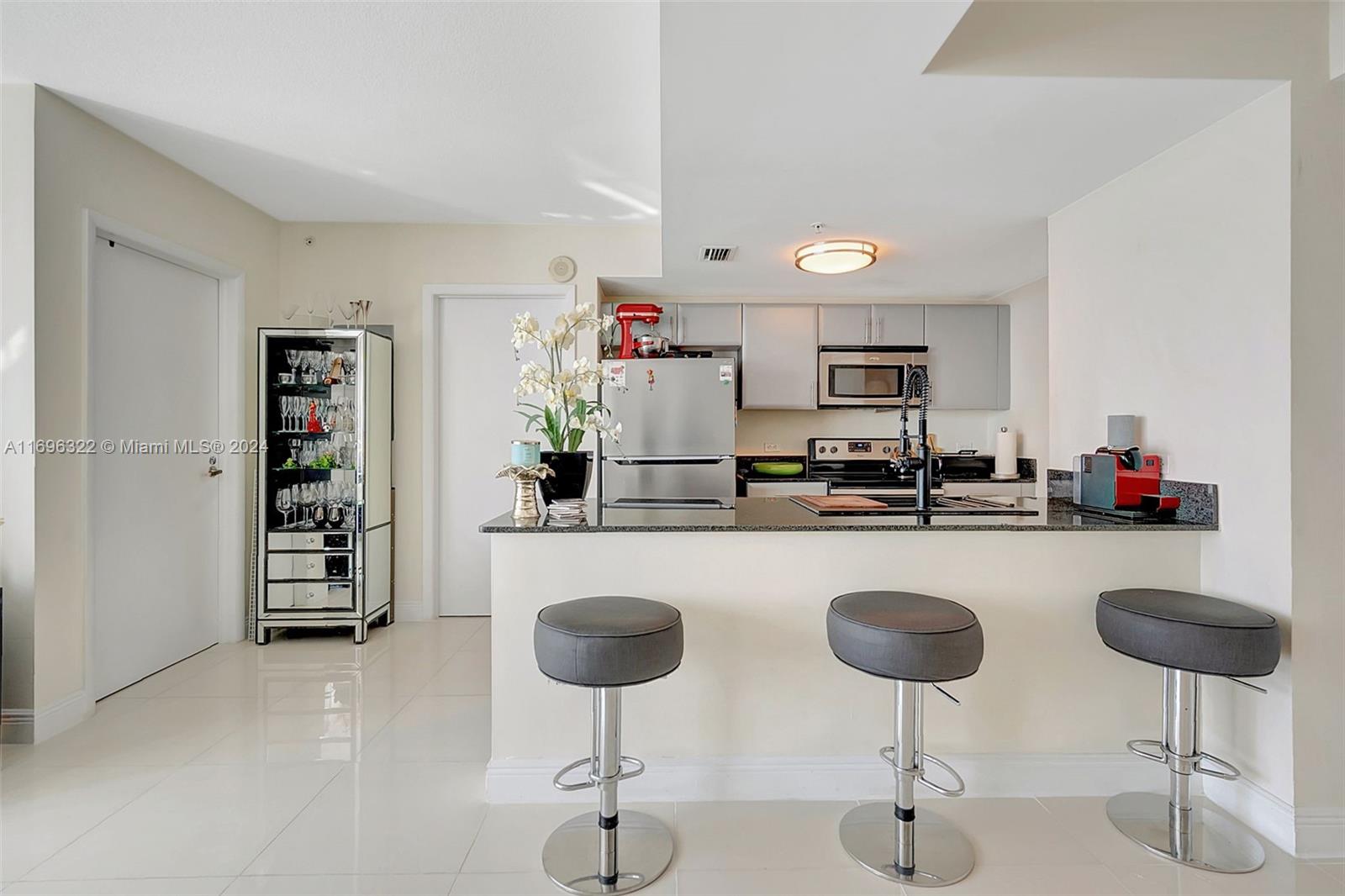 Welcome to this stunning 18th-floor two-bedroom, two-bathroom unit with breathtaking River and City views. Floor-to-ceiling windows and a large balcony fill the space with natural light. The split floor plan includes walk-in closets, a bright living area, and a modern kitchen with stainless steel appliances. Enjoy the convenience of a washer and dryer, two covered parking spaces, and ample guest parking.
Located in the historic Miami River District, just 10 minutes from Downtown, Brickell, and the airport, the building features resort-style amenities such as a pool, Fitness Center, Sauna, Jacuzzi, BBQ area, and more. With 24/7 security, a guard-gated entrance, and an attended lobby, this property offers peace of mind and luxurious living in a prime location.