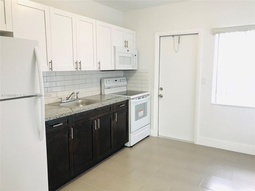 *DUPLEX* Beautiful Modern Style completely renovated apartment located in Buenavista Gardens. Minutes from the Design District, Wynwood, Midtown & I-95!. THIS UNIT FEATURES 2 SPACIOUS BEDROOMS, TILE FLOOR THROUGHOUT, 1 MODERN BATHROOM, WASHER AND DRYER. IMPACT WINDOWS. Central A/C, (2) Gated parking spaces. SAFELY PARK YOUR CAR INSIDE THE GATES. Private backyard perfect for great BBQ's and family fun. No Pets