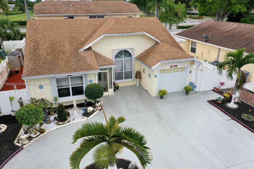 Rare 9-bedroom 4 bath home in the heart of Boca Raton. The first floor features a well-thought-out layout with 6 generously sized bedrooms, large eat-in kitchen with stainless steel appliances, entertainment room and living room. The master suite comes complete with a private bath, offering a serene retreat for its occupant. Additionally, a self-contained studio with its own private bath is great for guests or residents seeking extra privacy. Upstairs, you'll find 3 more spacious bedrooms that share a modern bathroom. Each room is designed with comfort in mind. The size of this home makes for a great opportunity for a buyer who needs a large home without a large price tag.