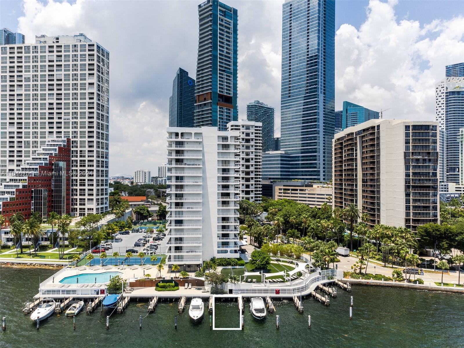 FOR RENT. Condo AND boat slip 210 sqft, fitting up to a 50 ft vessel. Fully remodeled bay-front condo in Brickell, Miami’s hottest neighborhood. The beautifully 2-bedroom 2-baths SW corner offers bay & city views, ample natural light, open modern kitchen w/ quartz tops & white porcelain floors, warm wood floors in living/dining, carpeted bedrooms, new AC & washer/dryer, impeccable finishes throughout w/ electric shades in living rm, expansive 320 sf corner terrace. Boutique low rise Brickell Harbour has been remodeled w/ tennis ct, bay-front pool & party rm, gym, sauna, BBQ, marina, & the best location.