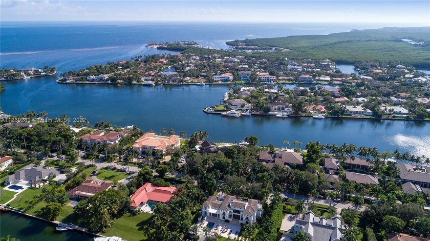 Enjoy beautiful views and privacy from this Tropical Modern residence sitting on the widest lagoon in the exclusive community of Gables Estates. 5beds/5.5 baths including chefs' kitchen w/top of the line appliances along with a practical floorplan including dramatic floor to ceiling windows leading out to the terrace; perfect for entertaining.  Ready to move in or build a one a kind estate on over an acre of prime real estate.