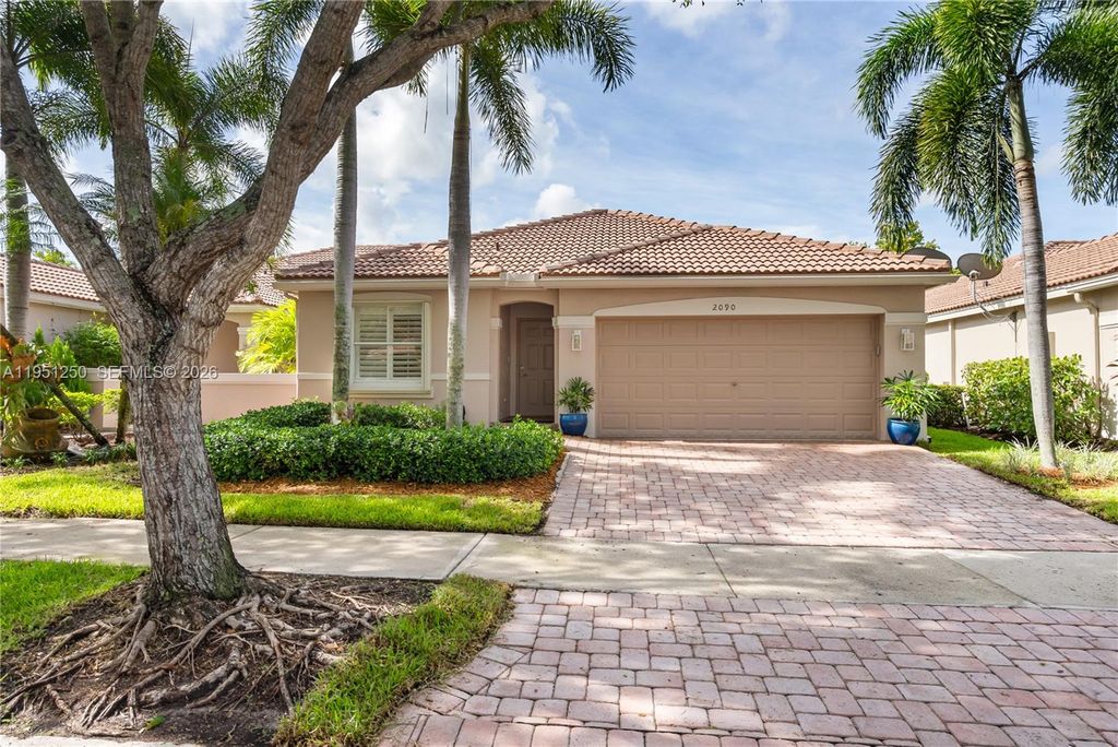 Photo of 2090 Borealis Way, Weston, FL 33327 (MLS # A11951250)