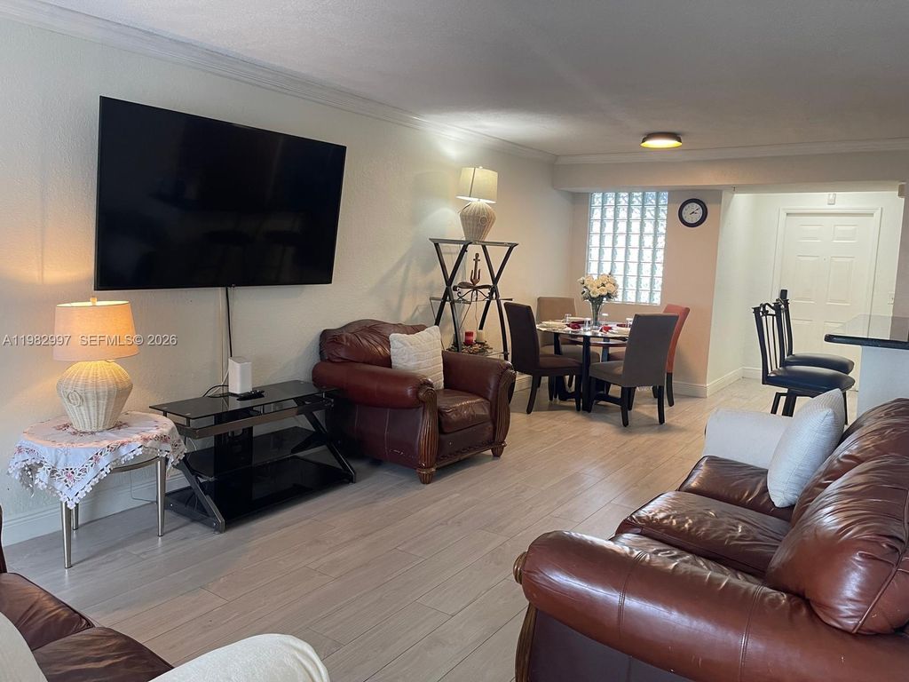 Photo of 150 NW 96th Ave #9-203, Pembroke Pines, FL 33024 (MLS # A11982997)