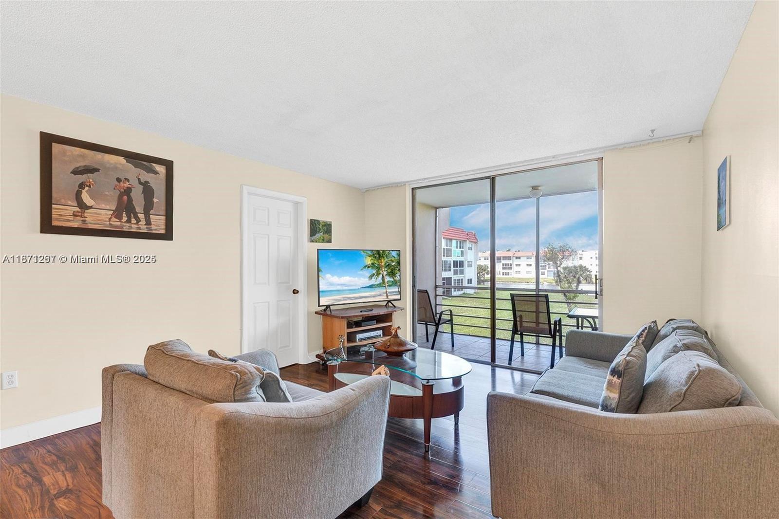 Spacious 2/2 with a relaxing waterview and screened balcony! Partially updated inside,this well maintained home is perfect for vacation/winter use and year-round enjoyment. Great location, close to beaches, transportation, shopping, dining, points of interest. Established active 55+ community offers multiple pools, state of the art fitness, pickleball & tennis, classes & clubs for resident enjoyment. A wonderful neighborhood with all ages. Retire and enjoy your life in style.See it today.