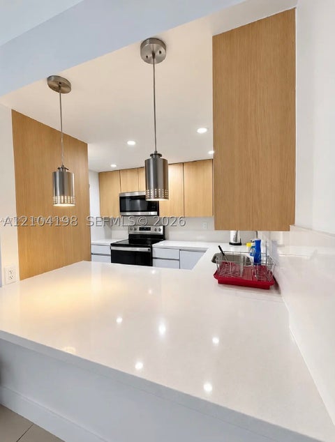 Photo of 4550 NW 9th St #102E, Miami, FL 33126 (MLS # A12104198)
