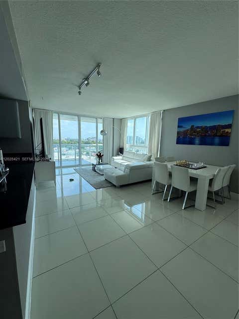 Photo of 1861 NW S River Dr #906, Miami, FL 33125 (MLS # A12028421)