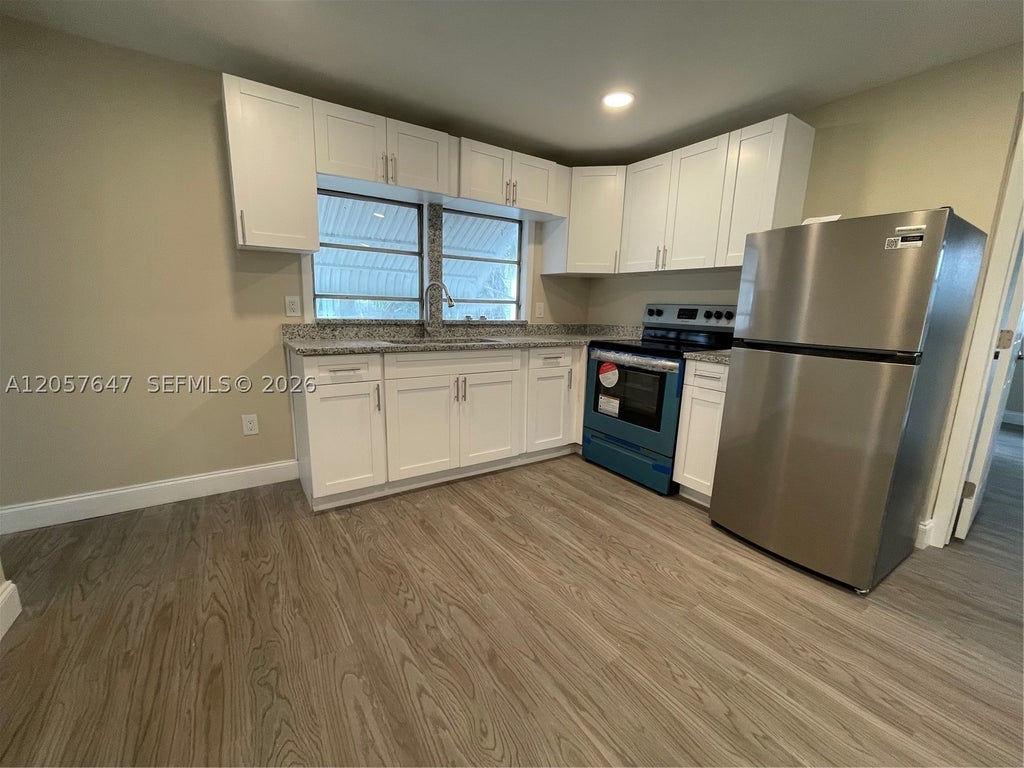 Photo of 10292 W Sandalfoot Blvd W #A, Boca Raton, FL 33428 (MLS # A12057647)