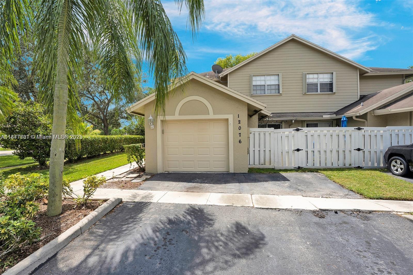 Welcome to Sunrise Manor West! This spacious 4-bedroom, 2.5-bath townhouse with a 1-car garage feels like a single-family home without the maintenance. Featuring a well-designed layout with wood floors throughout both levels, this home offers three bedrooms upstairs and one downstairs, currently used as an office. Enjoy peace of mind with hurricane shutters and an updated A/C system (inside unit 2017, outside unit 2020). The community includes a pool and is ideally located just minutes from major highways, Sawgrass Mills Mall, Publix, restaurants, and city parks. Families will appreciate being only 5 minutes from Franklin Academy, a highly-rated K–8 charter school. Don’t miss this opportunity call or text today for more information!