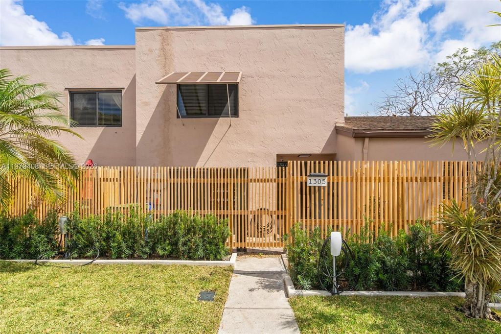 Photo of 1305 NW 122nd Ter, Pembroke Pines, FL 33026 (MLS # A11979408)