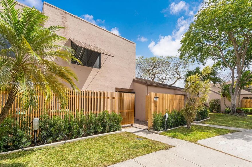 Save BIG Every Month with Solar- Powered Living. This beautifully updated home located in a gated community, features hurricane impact windows, a new roof, new flooring throughout, a fully remodeled kitchen with all new appliances, new A/C, in-unit washer and dryer, updated bathrooms, a large screened-in patio with spectacular lake views, and solar panels that significantly reduce electricity bills (around $50/month or less). The Community amenities include a clubhouse, pool, jacuzzi, tennis, and pickleball courts. Centrally located within walking distance to CB Smith Park, Memorial Hospital, and Pembroke Lakes Mall. Quick and easy approvals, no HOA application fees. Furniture is negotiable.