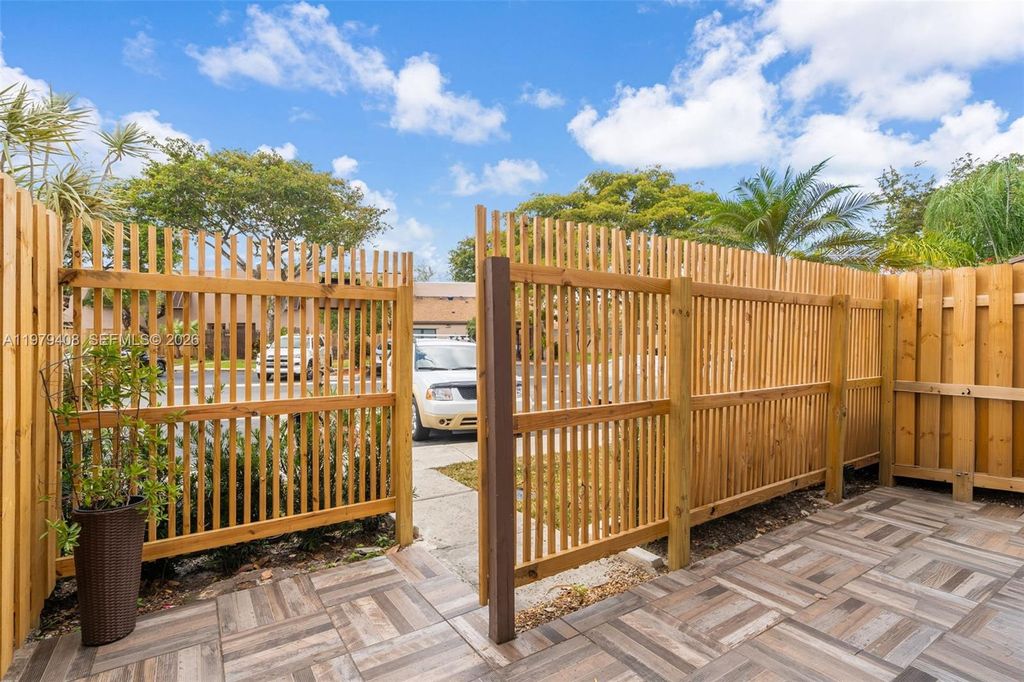 Photo of 1305 NW 122nd Ter, Pembroke Pines, FL 33026 (MLS # A11979408)