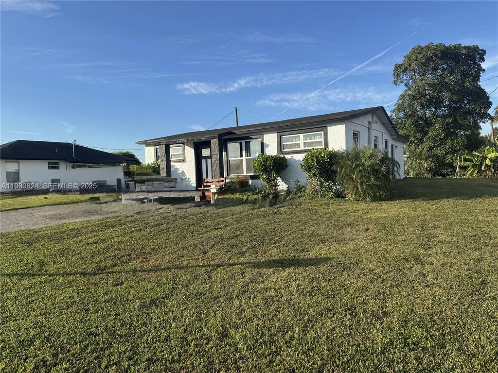 Photo of 415 SE 4th St, South Bay, FL 33493 (MLS # A11930824)