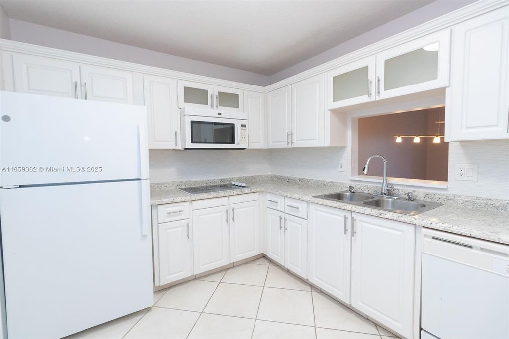 Photo of 218 NE 12th Ave #502, Hallandale Beach, FL 33009 (MLS # A11859382)