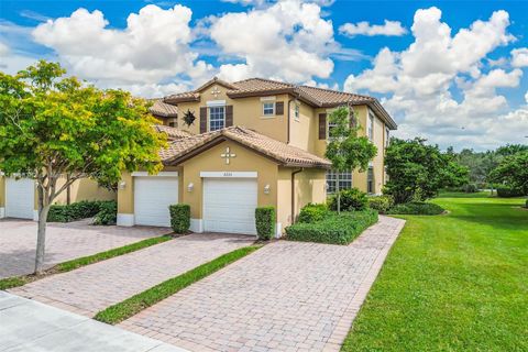 Photo of 8226 NW 127th Ln #30-C, Parkland, FL 33076 (MLS # A11908383)
